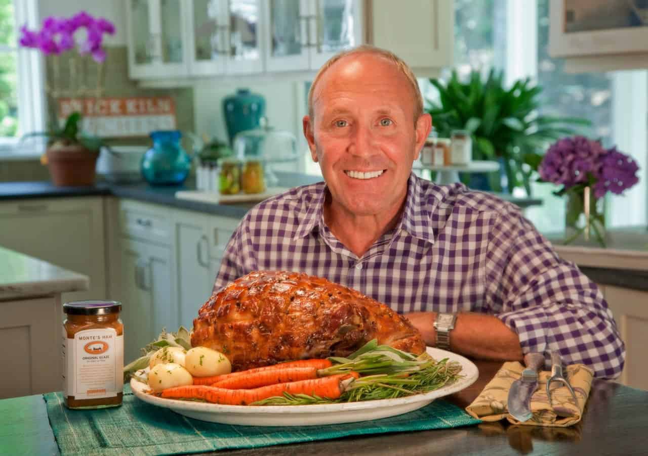 Monte Matthews sits with his ham. He developed the recipe for one of Saveur’s most beloved recipes.