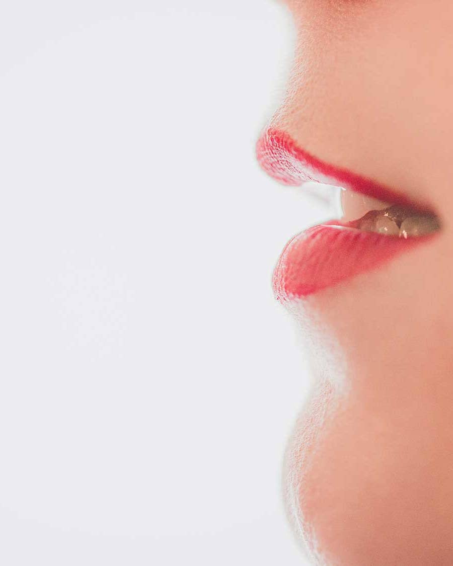 woman breathes through lips