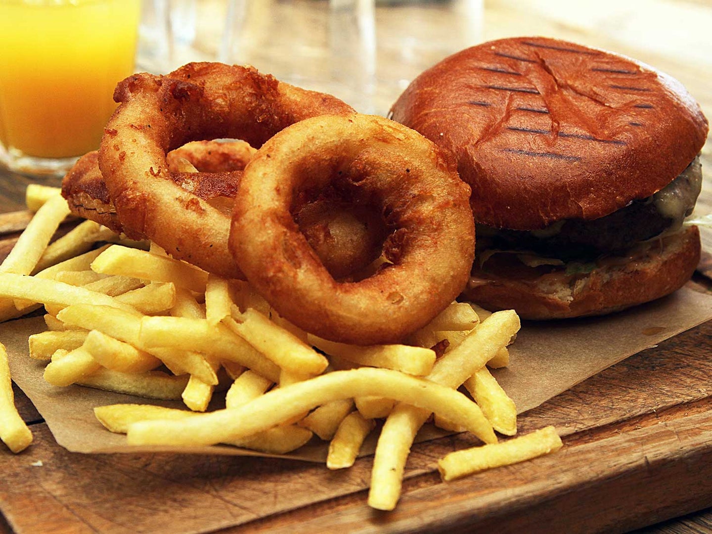 Burgers, fries, and onions rings