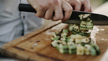 Person chopping vegetables
