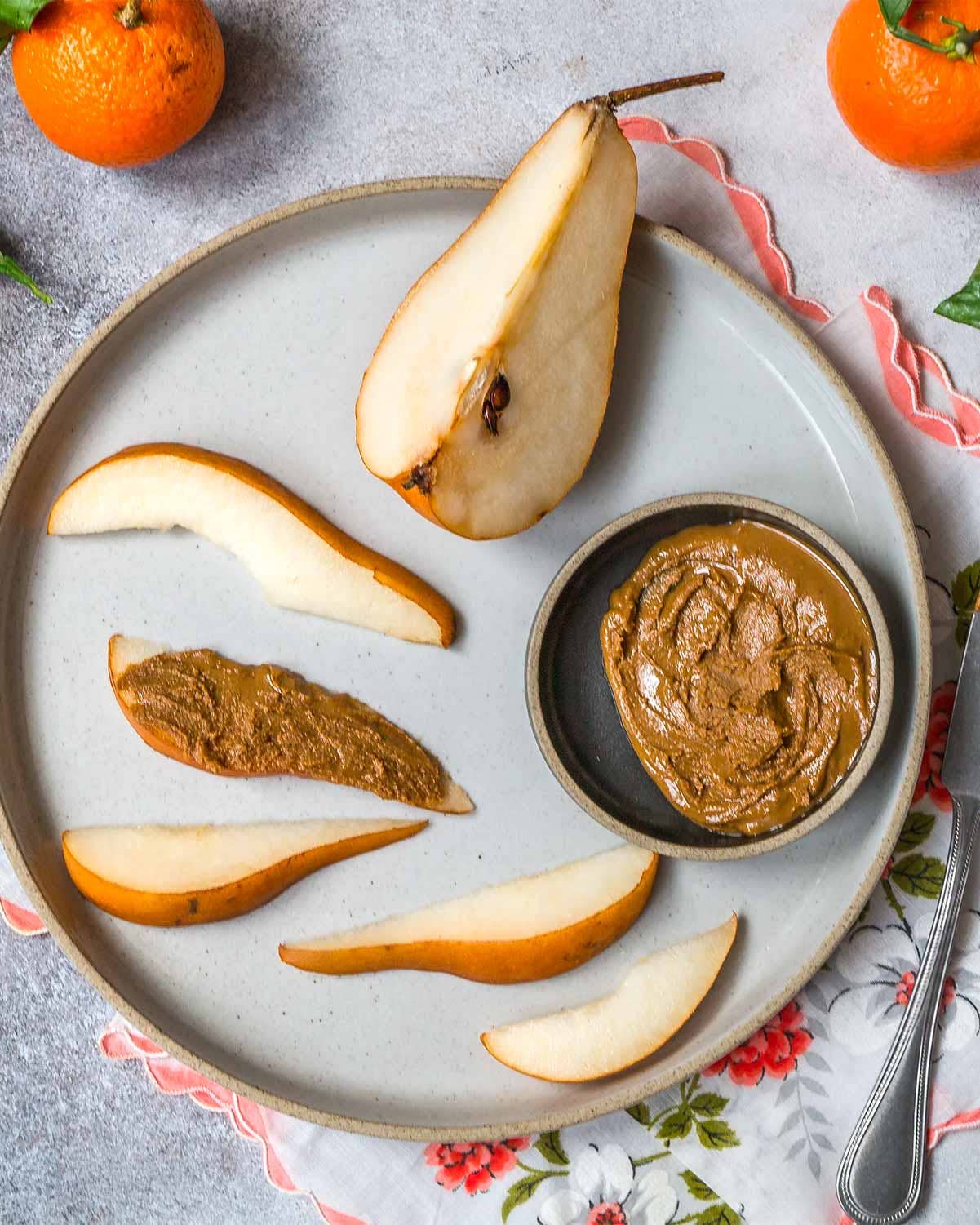 Almond butter on pear slices