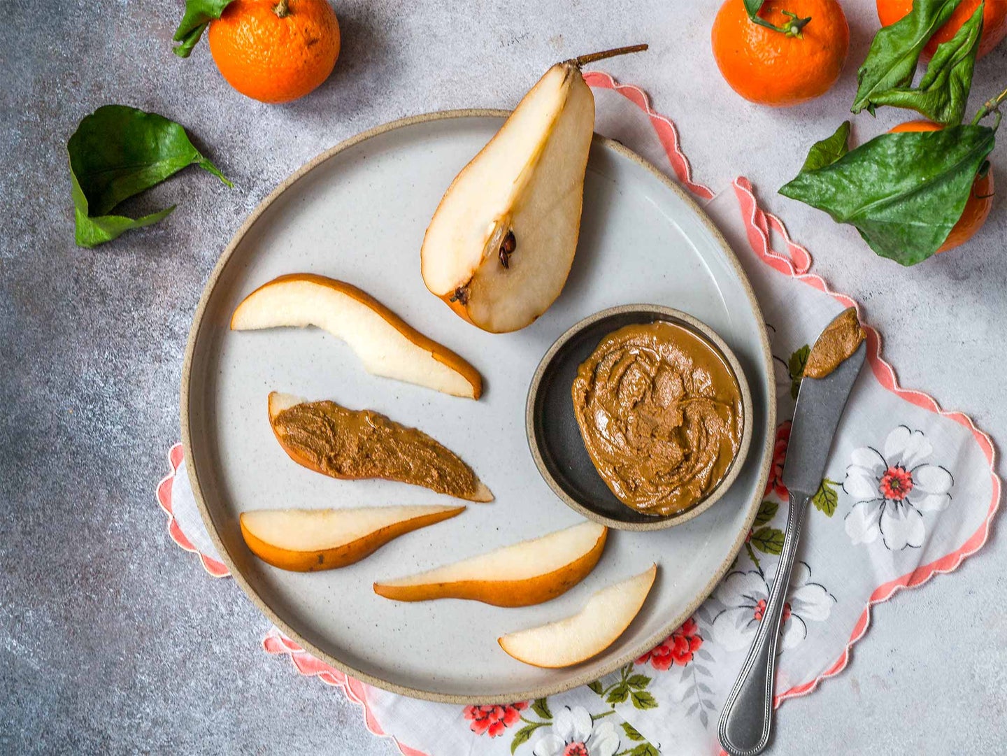 Almond butter on pear slices