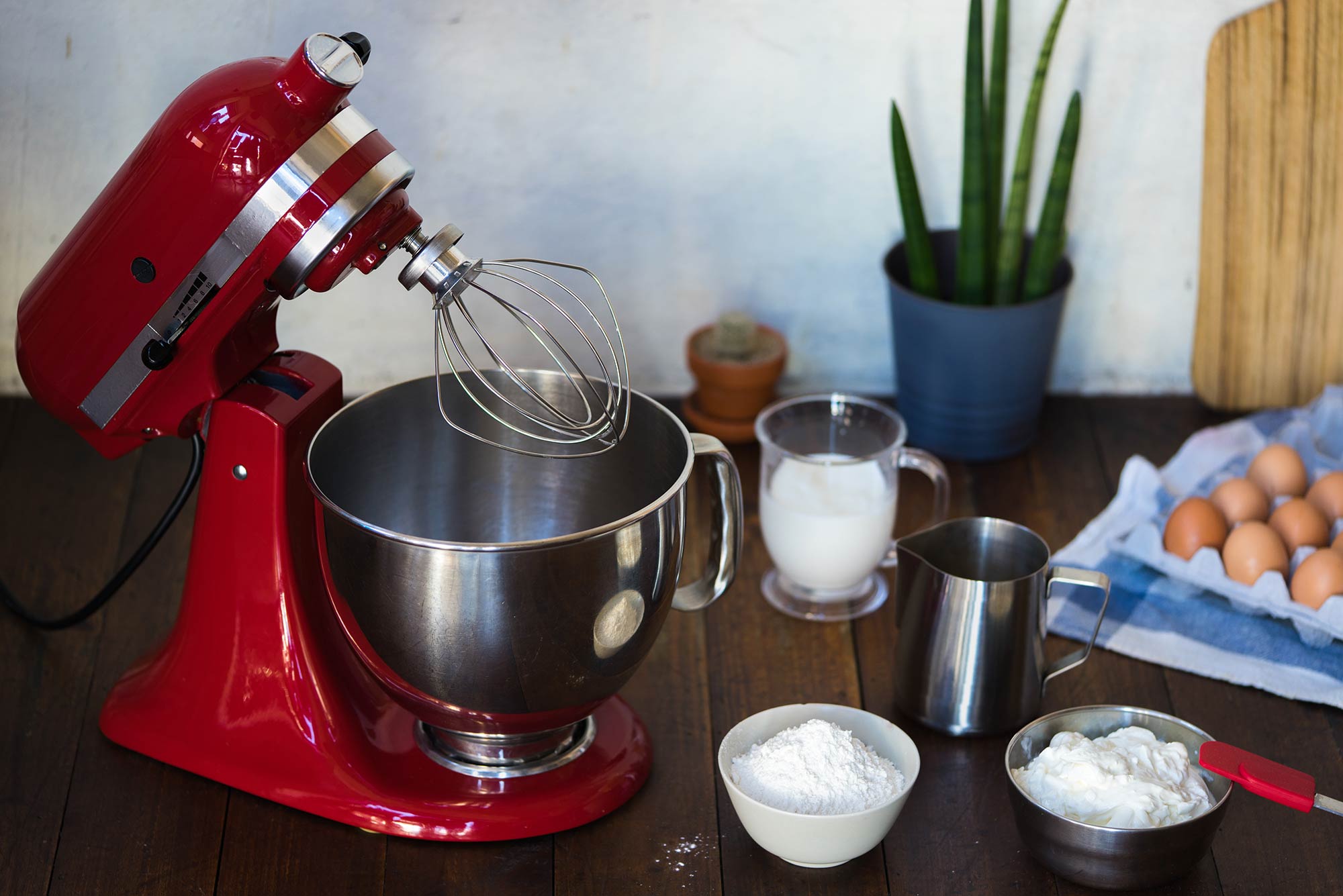 Red stand mixer on a countertop