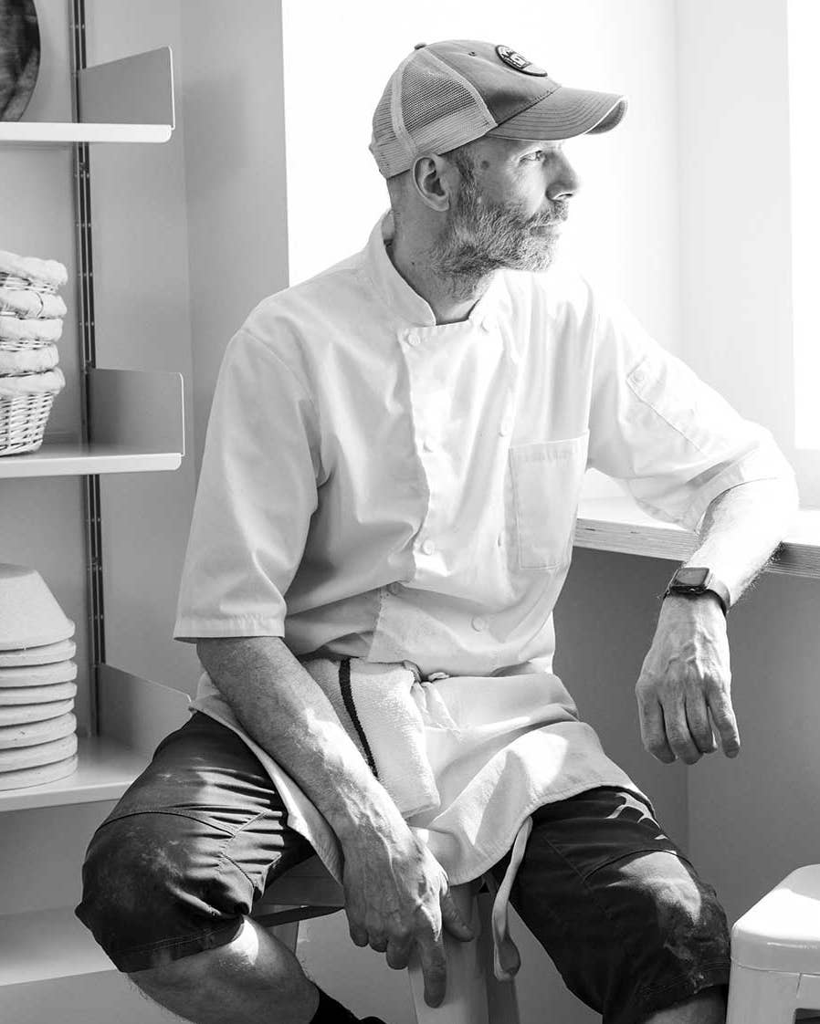 The bakery’s owner, Norman Jean Roy, in a rare moment of repose.