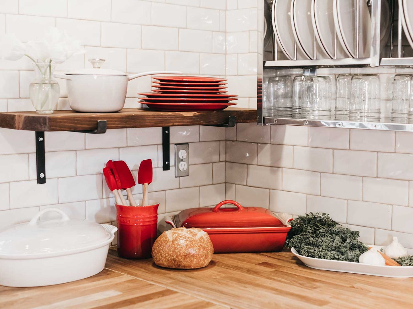 Kitchen tools sitting on kitchen counter.