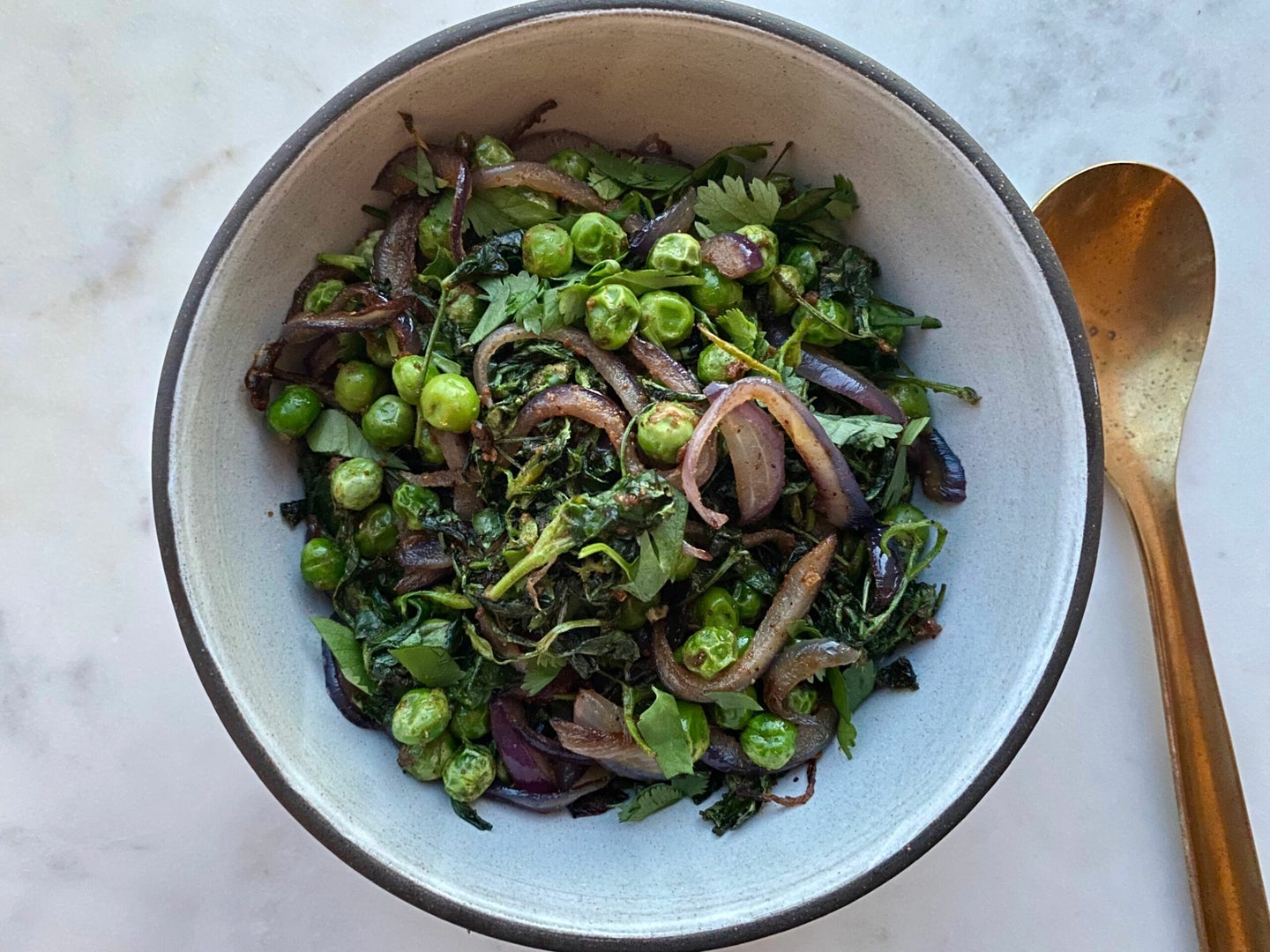 Indian fenugreek leaves and green peas (Bhaji Dana)