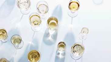 Overhead shot of white wine in glasses