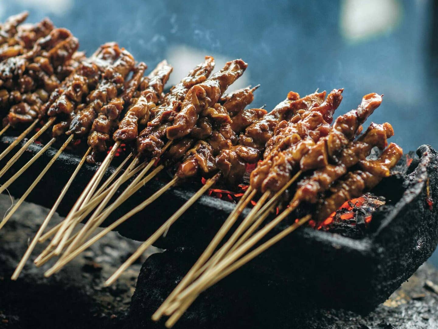 Chicken satay skewers with spicy peanut sauce (sate ayam)