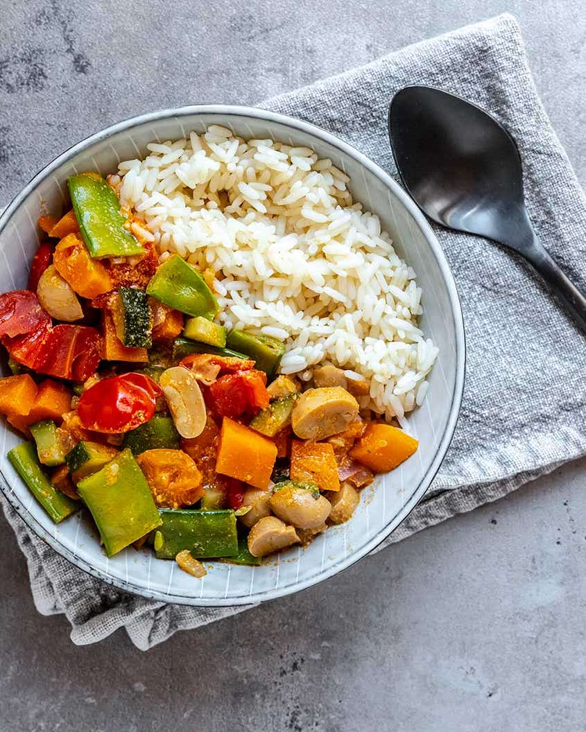 Unlock Easy Meals With the Best Food Steamers Bowl of Steamed Vegetables and Rice