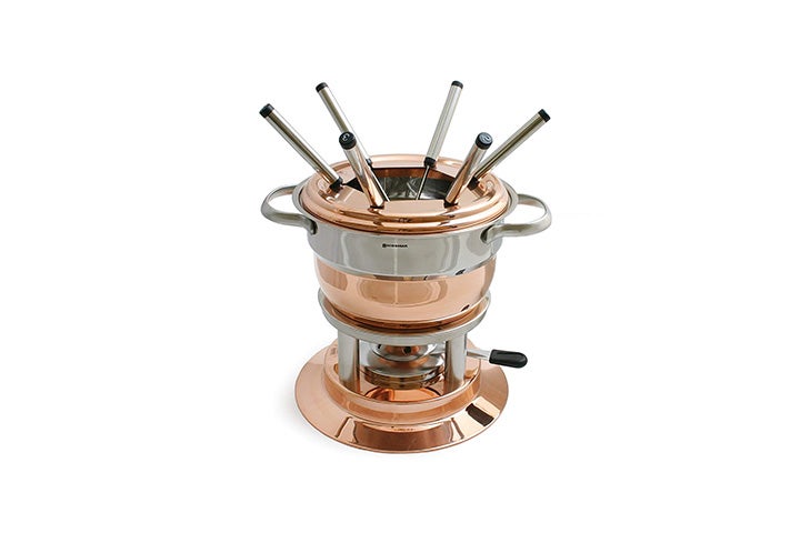 https://www.saveur.com/uploads/2022/01/26/best-fondue-pots-overall-swissmar-lausanne-copper-fondue-set-saveur.jpg?auto=webp