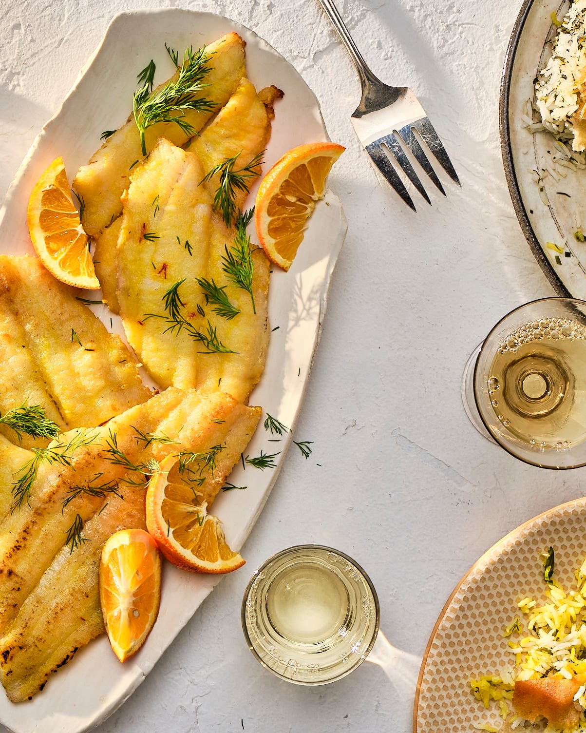 15 Eid Recipes for a Decadent and Festive End of Ramadan Persian-style saffron fish with herbed tahdig