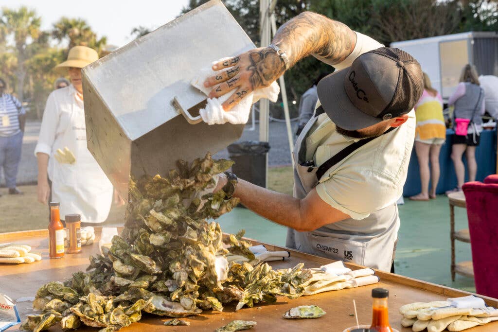 oysters being heaped onto table