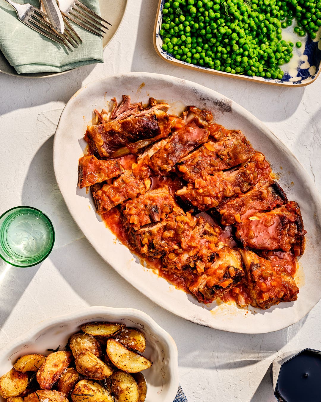 Braised Lamb Belly With Lemon, Harissa, and White Wine
