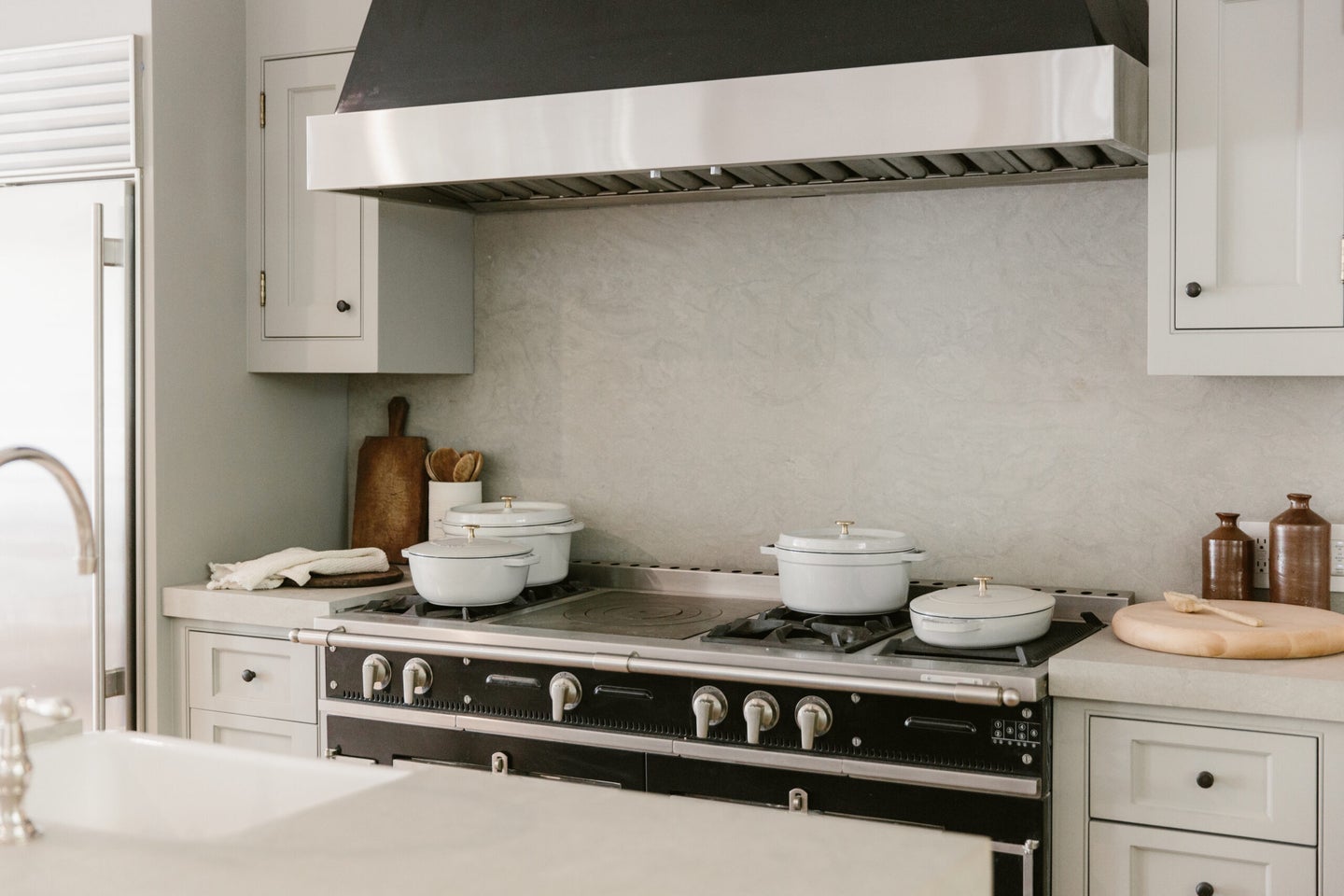 jenni kayne x staub collection showcased on the stove