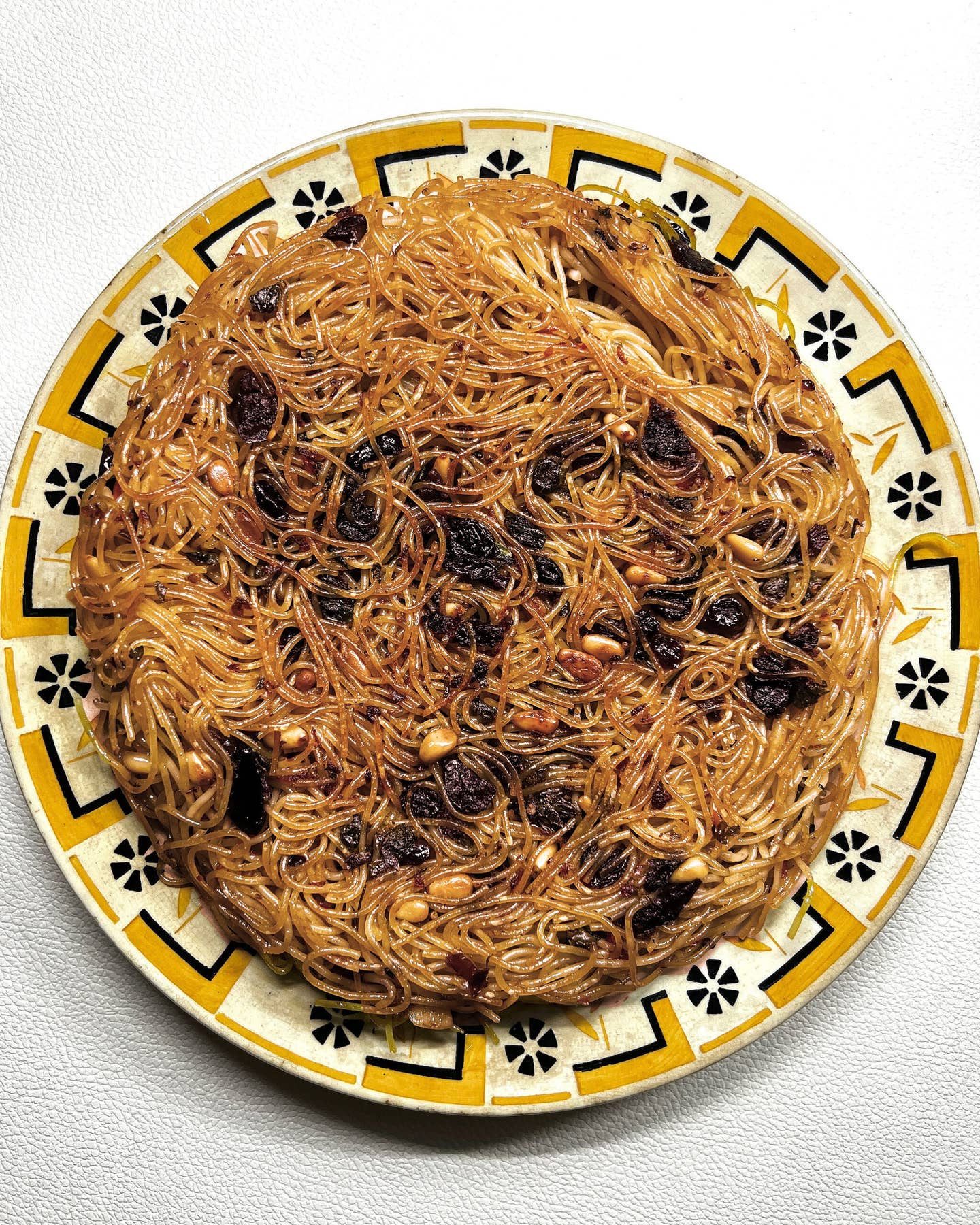 Eggless Pasta Frittata with Anchovies, Raisins, and Pine Nuts
