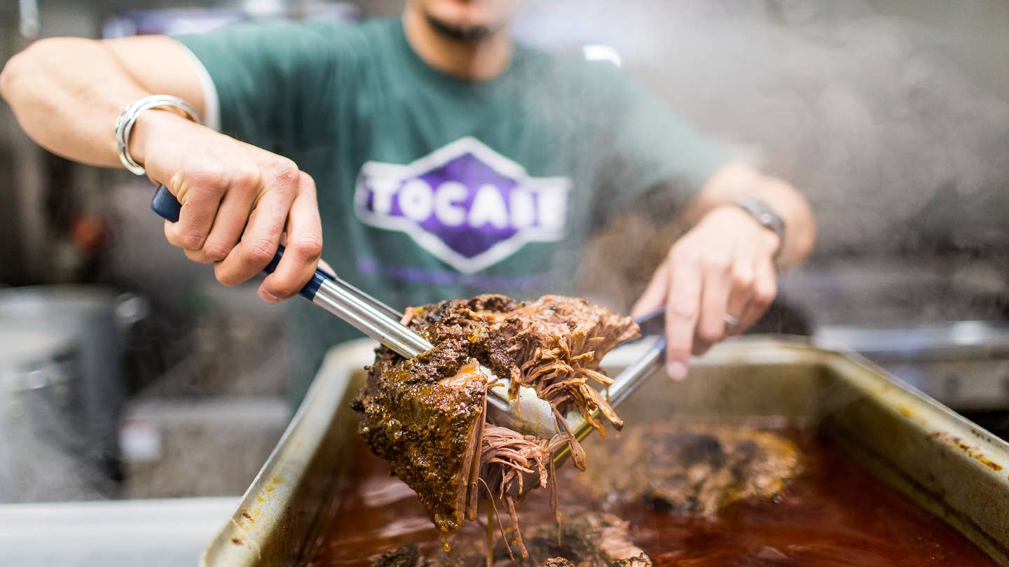 Why Osage Chef Ben Jacobs Launched a Direct-to-Tribe Meal Delivery Service TOCABE Ben Shredding Bison