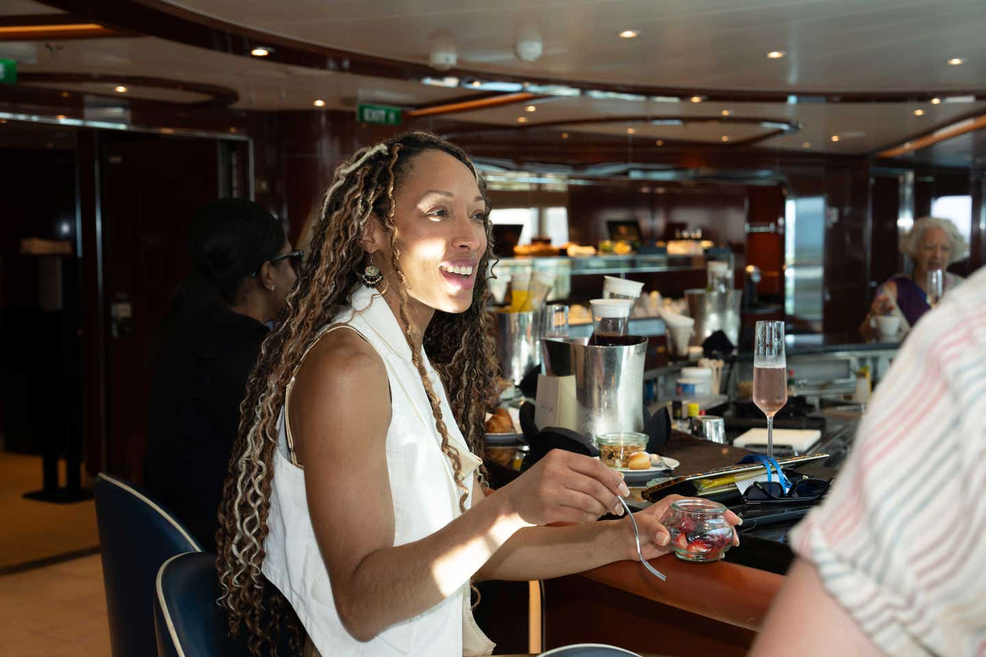 Chovitta Ariza enjoys a light breakfast in the Observation Bar. Chovitta Ariza enjoys a light breakfast in the Observation Bar.