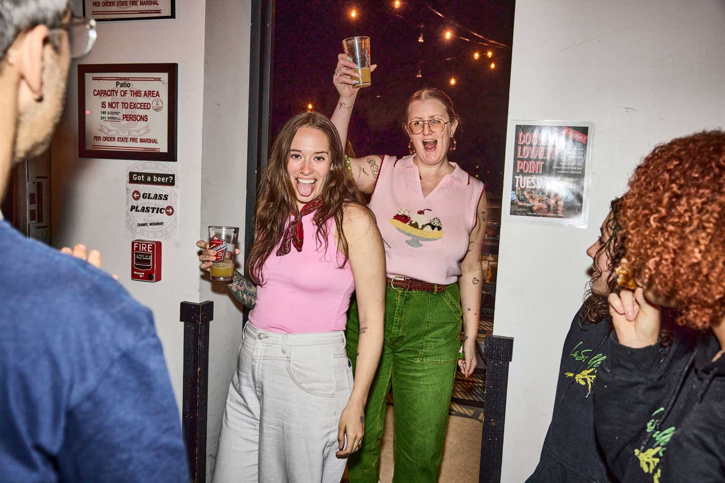 SAVEUR contributor and Boston Magazine photography editor Madison Trapkin (right) raised a glass with a friend. 