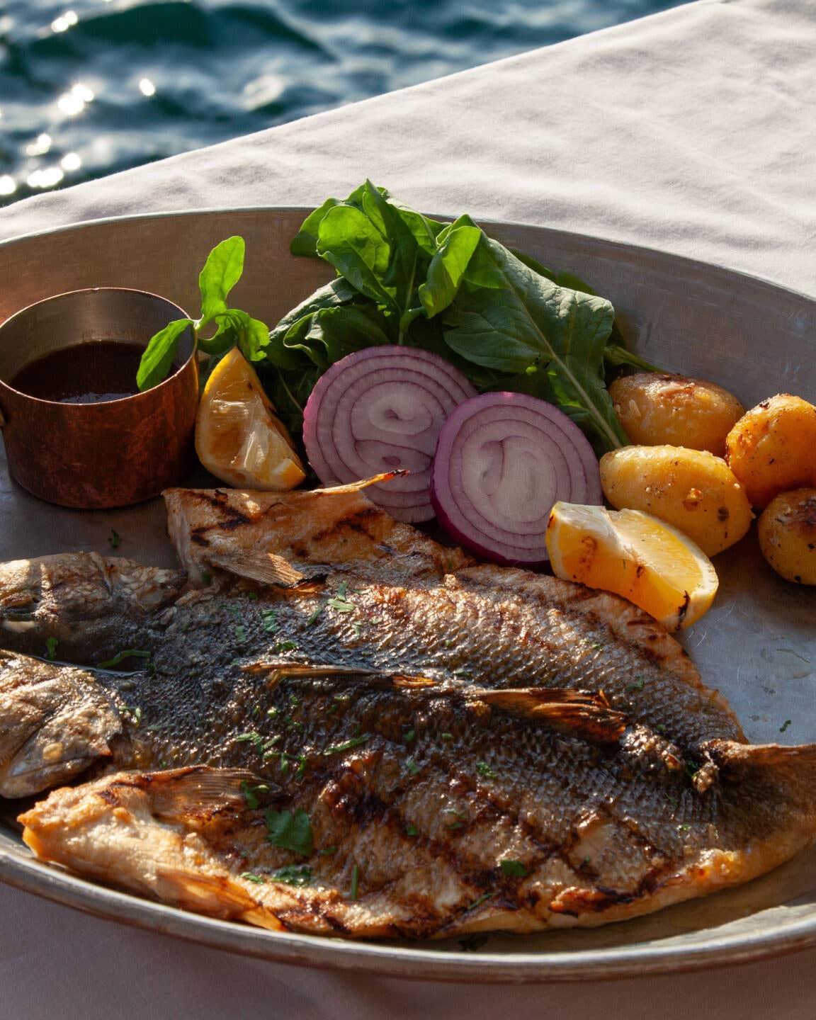 10 Must-Try Dishes That Capture the Essence of Istanbul Lakerda and Raki and Grilled Sea Bream