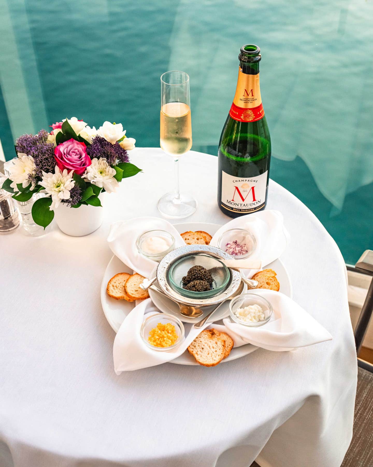 Champagne and caviar service on the stateroom balcony.