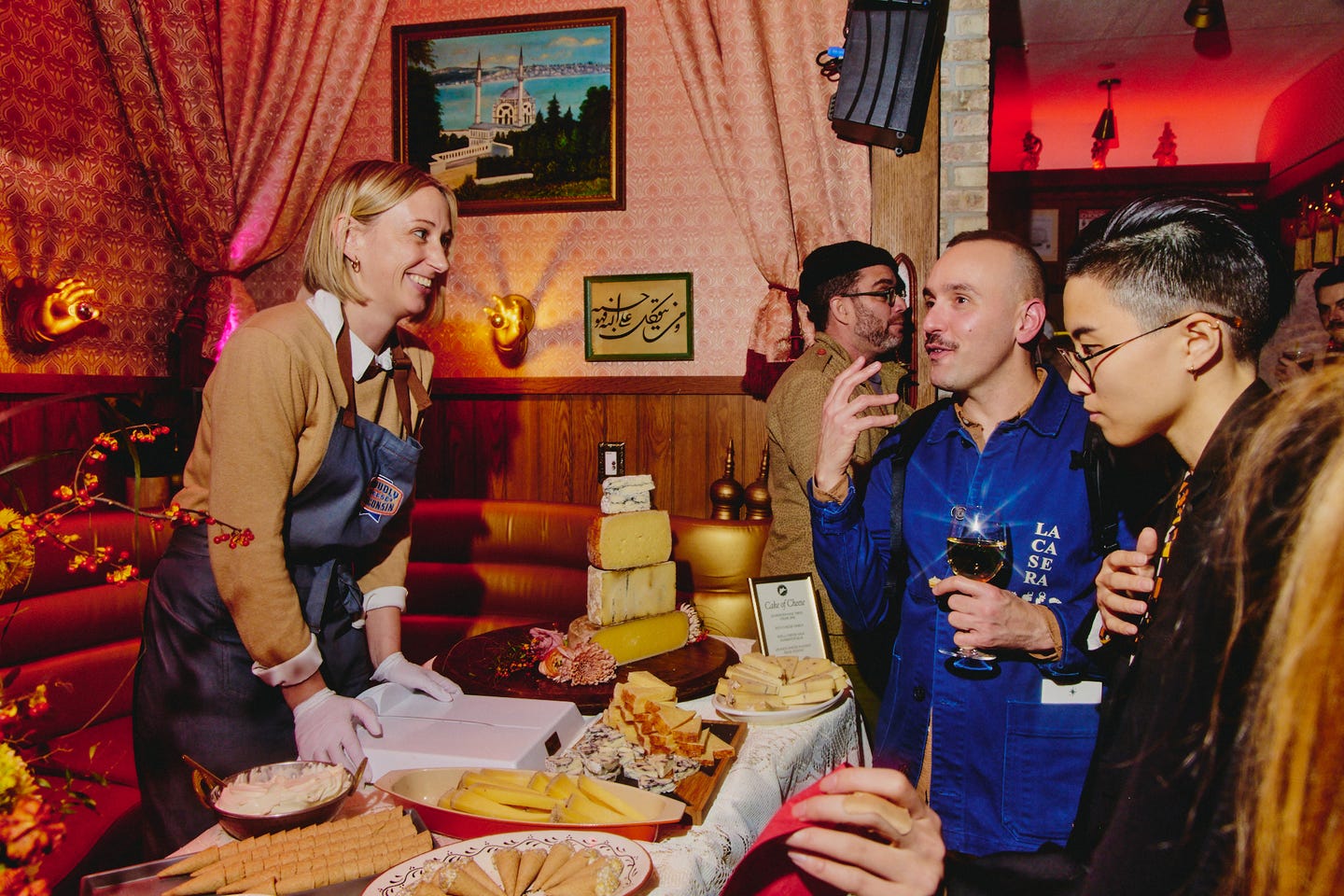 American Cheese Society Certified Cheese Professional John Braga and SAVEUR contributor Jessie YuChen checking out the Wisconsin Cheese table manned by Shannon Bonilla, ACS Certified Cheese Professional and Dairy Farmers of Wisconsin cheese marketing manager. 